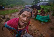 Best Tribal Villages to Visit in Odisha: Culture, Regions & Travel Guide Close-up portrait of a tribal woman in traditional jewellery and clothing in Odisha