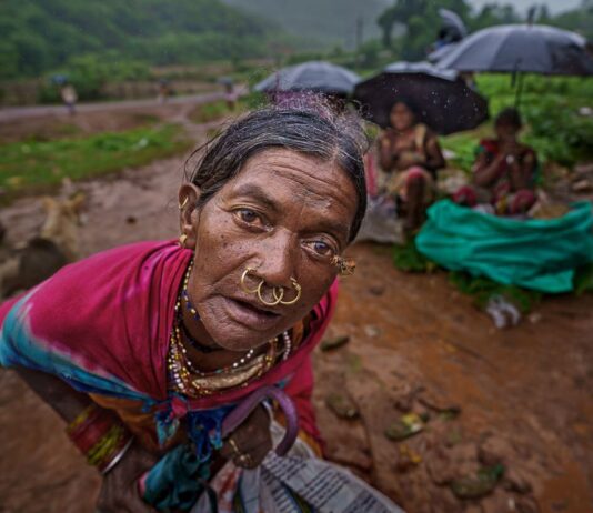 Best Tribal Villages to Visit in Odisha: Culture, Regions & Travel Guide Close-up portrait of a tribal woman in traditional jewellery and clothing in Odisha